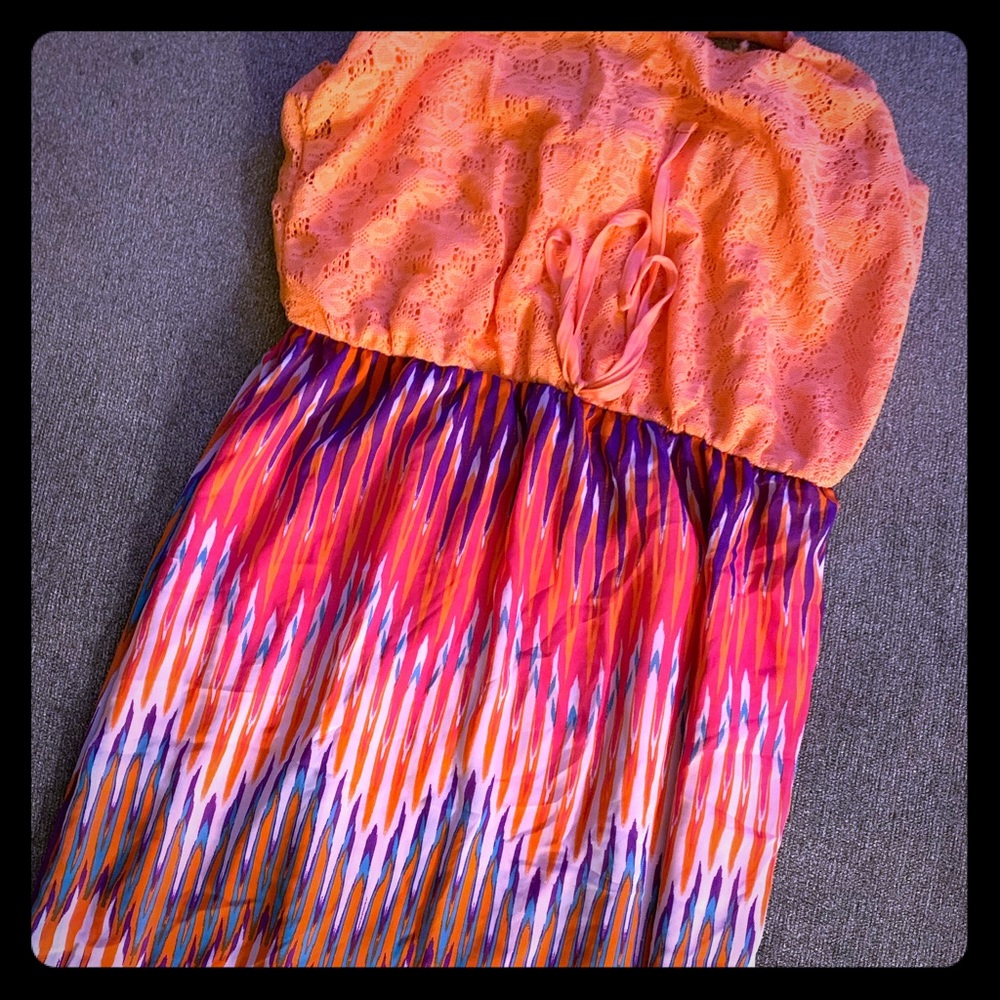 Orange maxi dress with a colorful skirt